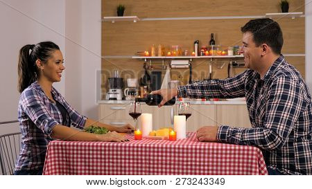 Sweet Couple Having A Romantic Dinner At Home