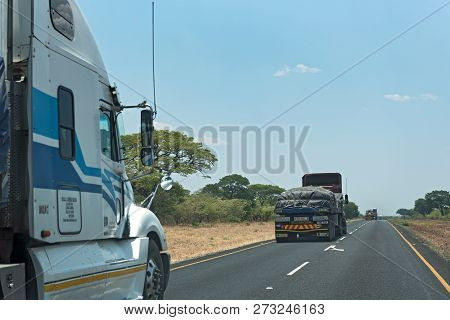 Kazungula, Botswana-november 17, 2018: Trucks On The Way To Kazungula Ferry Over The Zambezi River B