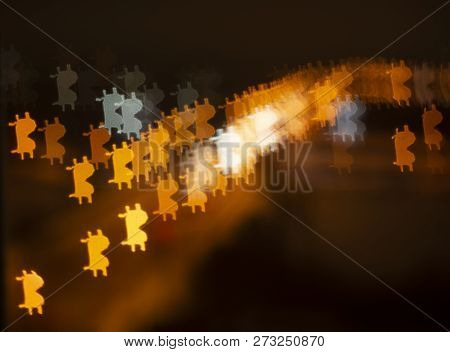 Background Of Bitcoin Symbols.on A Dark Foggy Background Cryptocurrency Bitcoin.uncertain Background