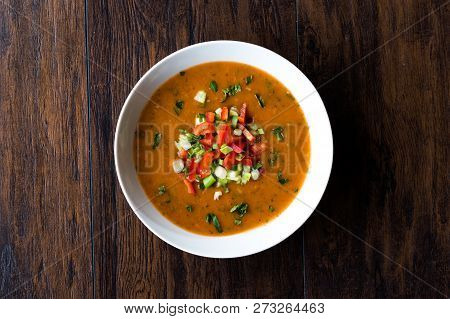 Traditional Konya Bulgur Soup Batirik With Sliced Cucumber, Tomatoes, Onion And Parsley