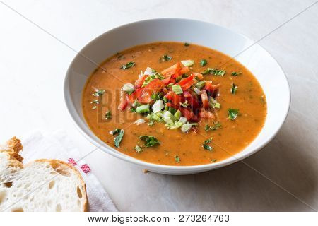 Traditional Konya Bulgur Soup Batirik With Sliced Cucumber, Tomatoes, Onion And Parsley