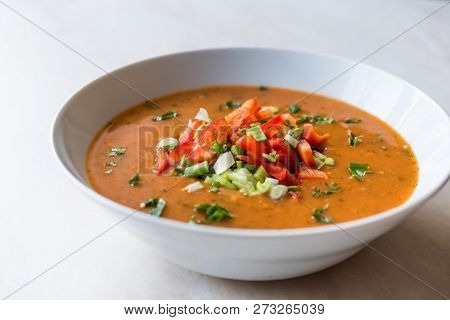 Traditional Konya Bulgur Soup Batirik With Sliced Cucumber, Tomatoes, Onion And Parsley