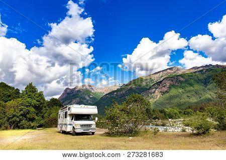 Panoramic View Of Motorhome Rv In Chilean Landscape In Andes. Family Trip Traval Vacation In Mauntai
