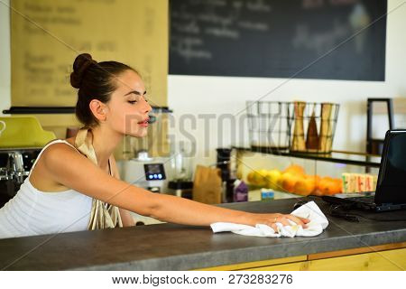 Everything Should Be Perfect. Barista Clean Counter Top In Bar. Woman Barista In Coffee Shop. Pretty