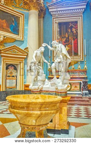 Mosta, Malta - June 14, 2018: The Aspersorium In Basilica Rotunda With Marble Sculpture, Depicting T