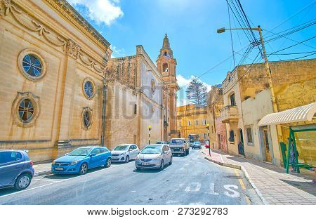 Naxxar, Malta - June 14, 2018: The Heavy Traffic On The Narrow Roads In Small Town Next To Local Par