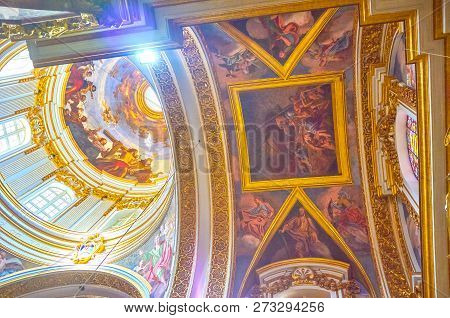 Mdina, Malta - June 14, 2018: The Metropolital Cathedral Boasts Beautiful Colorful Frescoes On Ceili