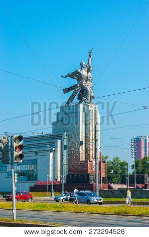 Moscow, Russia - June 29, 2013: Observe The Statue Of Worker And Kolkhoz Woman, Created Of Steel And