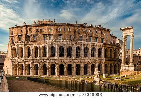 The Theatre of Marcellus, an ancient open-air theatre in Rome, Italy, built in the closing years of the Roman Republic. The ruins of Temple of Apollo Palatinus are on the right.