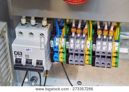 Modular Circuit Breaker And A Number Of Terminals In The Electrical Cabinet. Electrical Wires Or Cab
