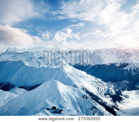 Sunny winter day in skiing area in the Paznaun valley. Location place famous ski resort Silvretta Arena Ischgl/Samnaun on the Swiss Austrian border. State Tyrol, Europe. Discover the beauty of earth.
