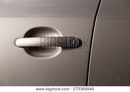 New Polished Car Paintwork. Car Door Handle Closeup.