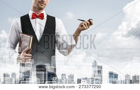 Double Exposure Of Confident And Young Businessman In Smart-casual Wear Smoking Pipe And Modern City