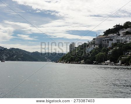 Bordered Of Mountains, The Bay Offers A Superblandscape But Was Difficult To Arrange, Blocking The H