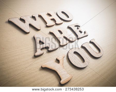 Who Are You In Wooden Words Letter, Motivational Self Development Business Typography Quotes Concept