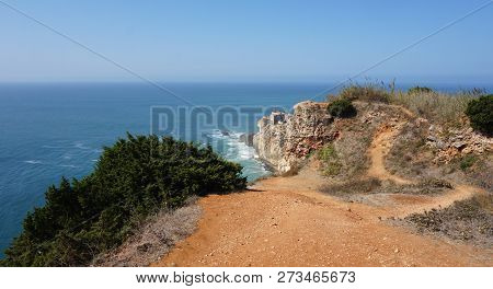 Famous Surf Spot At Nazare Lighthouse In Portugal