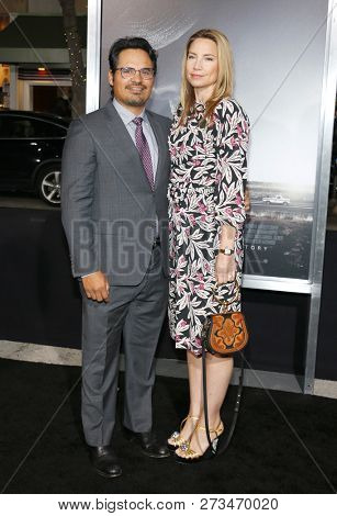 Michael Pena and Brie Shaffer at the World premiere of 'The Mule' held at the Regency Village Theatre in Westwood, USA on December 10, 2018.