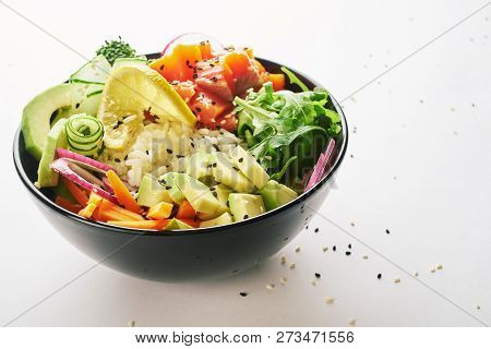 Poke Bowl With Salmon Islated On White Background. Side View