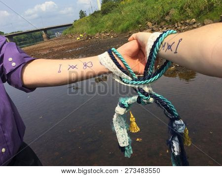 Rope Hand Fasting Ceremony By The Lake
