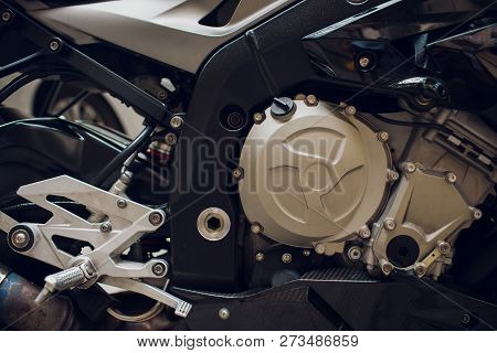 Detail On A Modern And Dirty Motorcycle Engine With Oil Fugues.