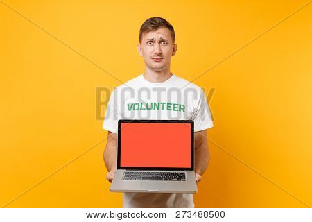 Man In White T-shirt Written Inscription Green Title Volunteer Hold Laptop Pc Computer With Blank Em