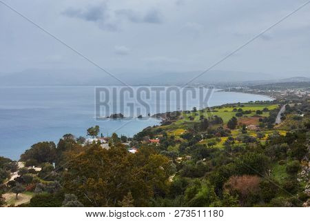 Looking Across A Campsite Towards Chrysohou Bay, Laatchi, Polis And The Troodos Mountains, Akamas Pe