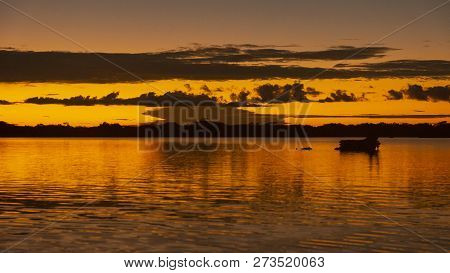 Sunset In The Cuyabeno Lagoon, Within The Cuyabeno Faunistic Production Reserve. It Is One Of The Mo