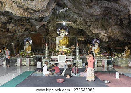 Hpa-an, Myanmar - 19 November, 2018: Horizontal Picture Of Local People Praying In Front Of Buddha S