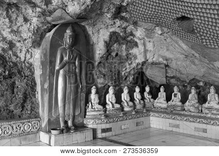 Hpa-an, Myanmar - 19 November, 2018: Black And White Picture Of Different Buddhas Statues Inside Of 