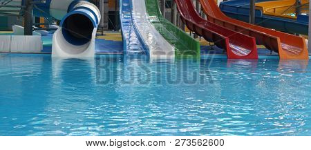 Water park. Blue pool slide swimming. Aquapark.