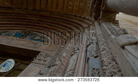 Cathedral Of Verona, External Romanesque Architecture With Bestiaries Carved In Marble