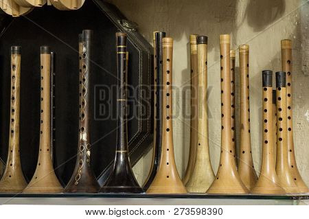 Dozens Of Handmade Wooden Flutes Or Shrill Pipe