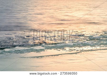 First Ice On The Lake In Late Autumn. Winter Coming Landscape