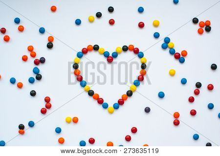 Beautiful Heart Made Of Colorful Chocolates With Chocolate