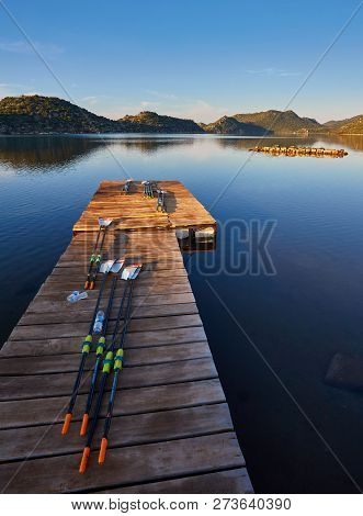 Oars For Kayaks Lie On The Dock, The Islands Of Kekova At Dawn, Turkey