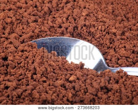 Instant Coffee  And Teaspoon At Dry Sunny Summer Day