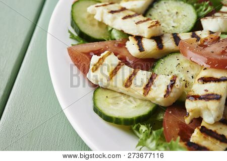 Plate Of Slad With Halloumi, Tomato And Cucumber