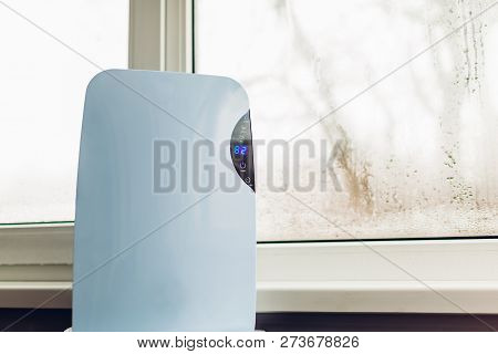 Dehumidifier With Touch Panel, Humidity Indicator, Uv Lamp, Air Ionizer, Water Container Works By We