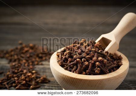 Cloves  On A Gray Wooden Background, Close-up