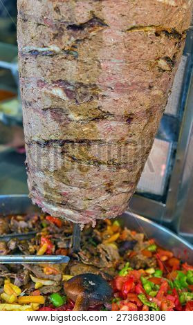 Istanbul Street Food Doner Kebab Made Of Meat Cooked On A Vertical Rotisserie. Traditional Turkish D