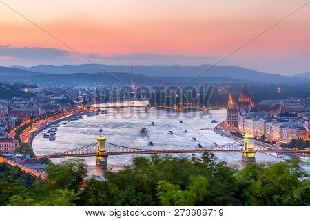 Budapest Panorama With Parliament And Bridges During Evening Twilight Sunset. View From Citadel