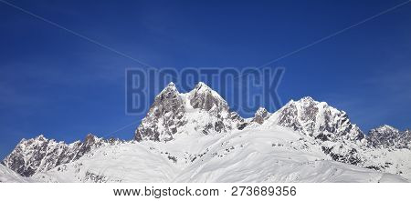 Panoramic View On Snowy Mountains And Blue Sky At Sunny Winter Day. Caucasus Mountains. Svaneti Regi