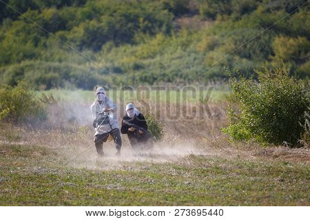 Sambek, Rostov Region, Russia, August 19, 2018: Reconstruction Of Afghan War. Mujahid Shoots A Machi