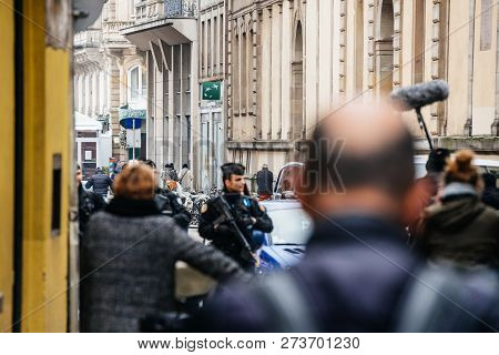 Strasbourg, France - Dec 11, 2018: Rear View Of French Police Officers Securing Rue De Loutre City C