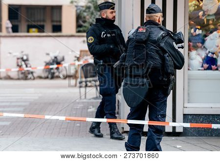 Strasbourg, France - Dec 11, 2018: French Police Officers Securing Rue Du Saumon Zone Of A Crime Sce