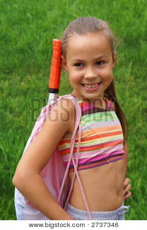 Flicka med tennisracket