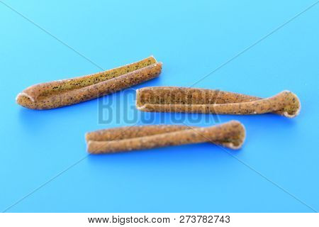 Some Casarecce Of Legume With Blue Background
