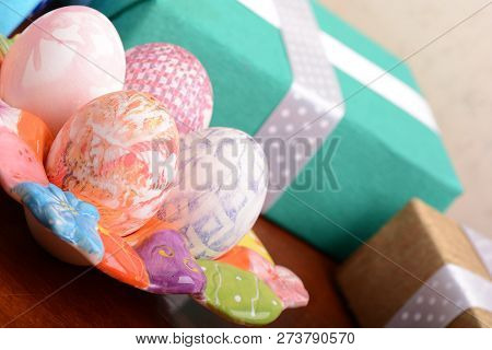 Handcrafted Easter Eggs Close Up, Gift Boxes , Ribbons And Decoration