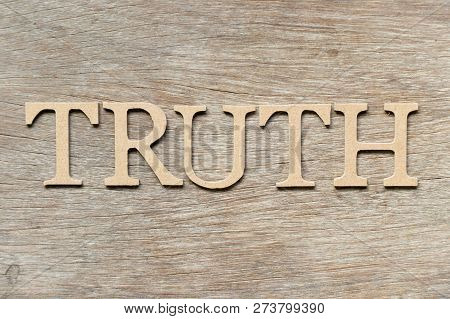Alphabet Letter In Word Truth On Wood Background
