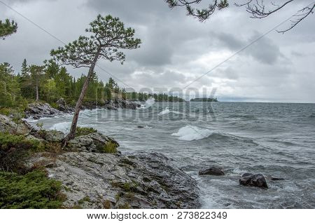 A Scenic View Of The Beautiful And Rugged Lake Superior Shoreline As It Gets Battered By Stormy Weat